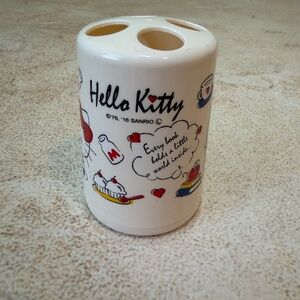 Sanrio Hello Kitty White Toothbrush Holder with Red and Blue Accents